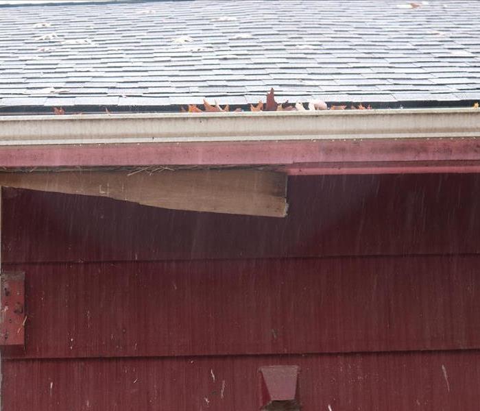 Repairing Storm-Damaged Exterior of Woodlawn Heights, NY House